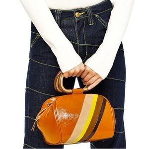 Tory Burch top handle bag stripe suede patent leather patchwork half moon